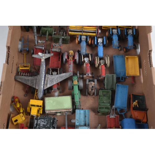 28 - A QUANTITY OF UNBOXED AND ASSORTED PLAYWORN DIECAST VEHICLES, majority are lorries/trucks and agricu... 