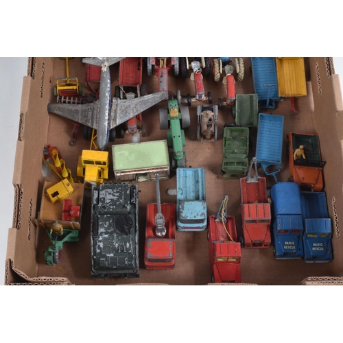 28 - A QUANTITY OF UNBOXED AND ASSORTED PLAYWORN DIECAST VEHICLES, majority are lorries/trucks and agricu... 