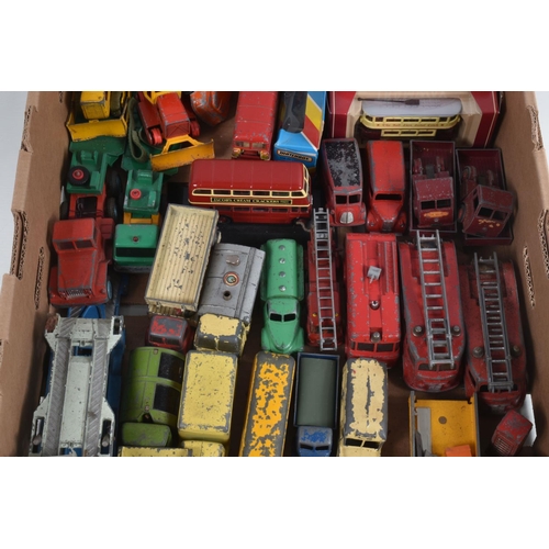 28 - A QUANTITY OF UNBOXED AND ASSORTED PLAYWORN DIECAST VEHICLES, majority are lorries/trucks and agricu... 