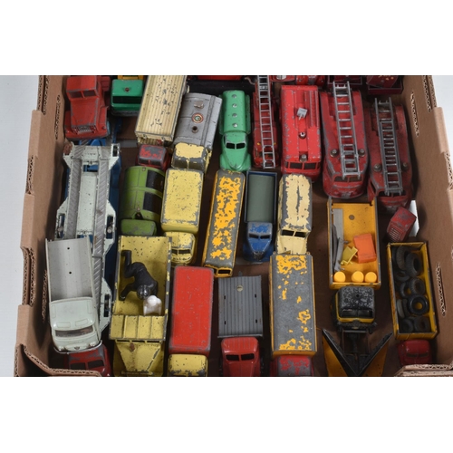 28 - A QUANTITY OF UNBOXED AND ASSORTED PLAYWORN DIECAST VEHICLES, majority are lorries/trucks and agricu... 