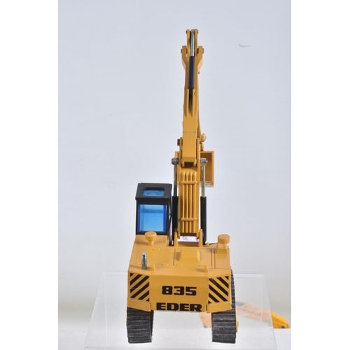 3 - THREE BOXED NZG EXCAVATOR MODELS, all 1/50 scale, Caterpillar 224 Wheeled, No.259 , Eder 835 Tracked... 