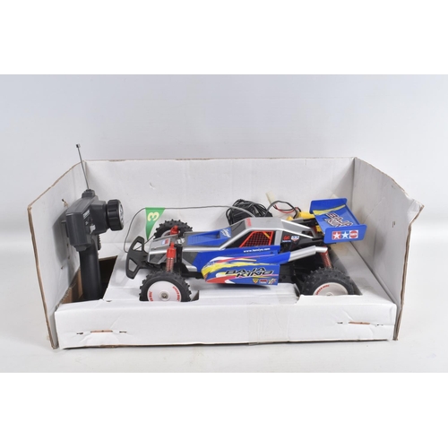 67 - A BOXED TAMIYA 'BAJA KING' 1/10 SCALE QUICK DRIVE RADIO CONTROL CAR, not tested, appears largely com... 