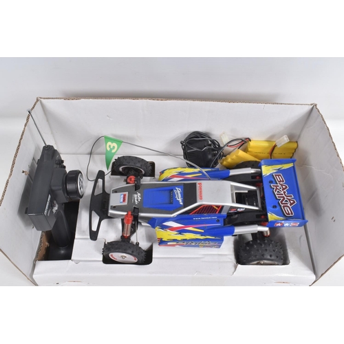 67 - A BOXED TAMIYA 'BAJA KING' 1/10 SCALE QUICK DRIVE RADIO CONTROL CAR, not tested, appears largely com... 