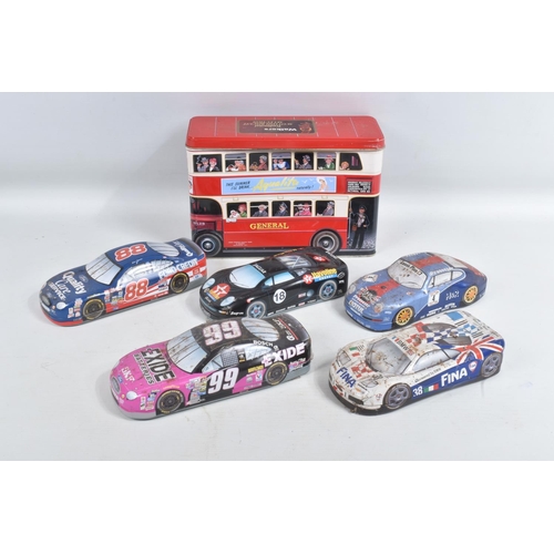 69 - A COLLECTION OF MODEL  KITS, A PUZZLE AND ASSORTED TINS, AND A GAME ALL RELATING TO VEHICLES, there ... 