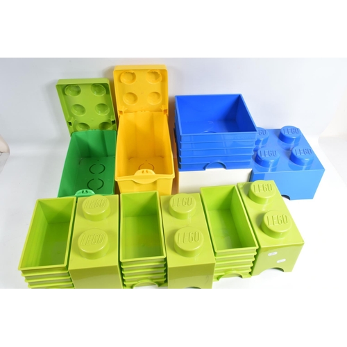 72 - A QUANTITY OF ASSORTED EMPTY PLASTIC LEGO STORAGE BOXES, majority shaped as Lego bricks and are stac... 