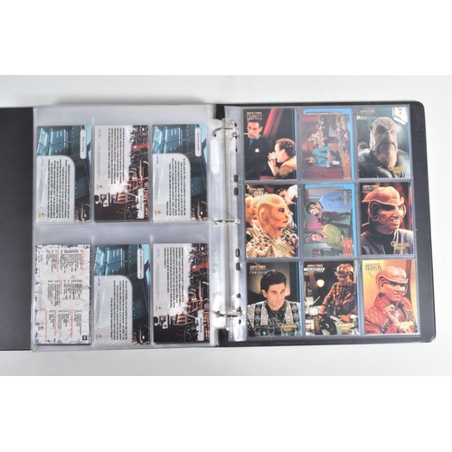 92 - A COLLECTION OF STAR TREK FIRST CONTACT TRADING CARDS, to include a nicely presented binder with car... 