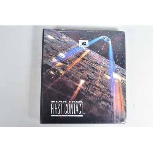 92 - A COLLECTION OF STAR TREK FIRST CONTACT TRADING CARDS, to include a nicely presented binder with car... 