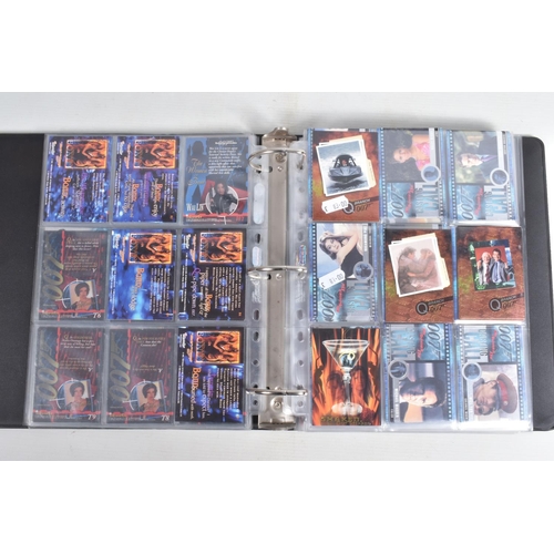 93 - A COLLECTION OF JAMES BOND 007 TRADING CARDS,  to include a binder with cards housed in plastic fold... 