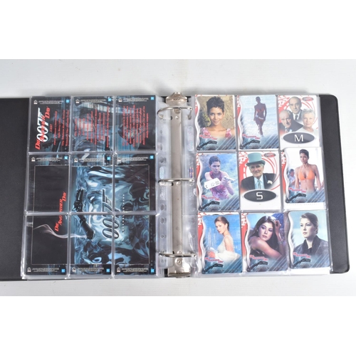 93 - A COLLECTION OF JAMES BOND 007 TRADING CARDS,  to include a binder with cards housed in plastic fold... 