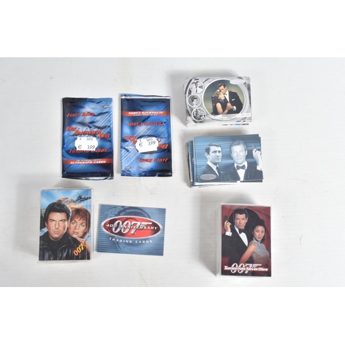 93 - A COLLECTION OF JAMES BOND 007 TRADING CARDS,  to include a binder with cards housed in plastic fold... 