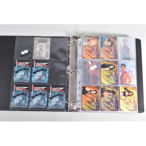 93 - A COLLECTION OF JAMES BOND 007 TRADING CARDS,  to include a binder with cards housed in plastic fold... 