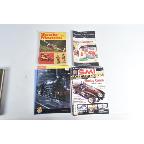 98 - A QUANTITY OF BOOKS AND MAGAZINES RELATING TO DIECAST TOYS AND MODEL RAILWAYS, books include The Off... 