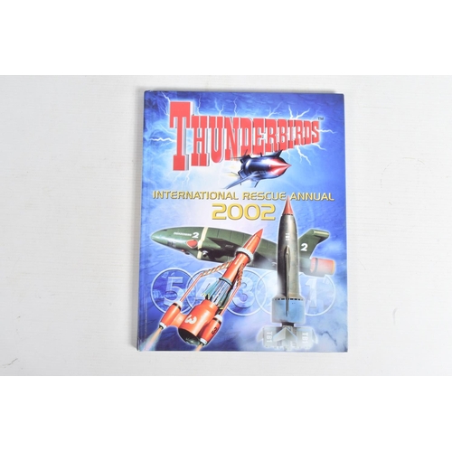 103 - A COLLECTION OF ASSORTED THUNDERBIRD COLLECTIBLES, to include a hardback book 'Thunderbirds Internat... 