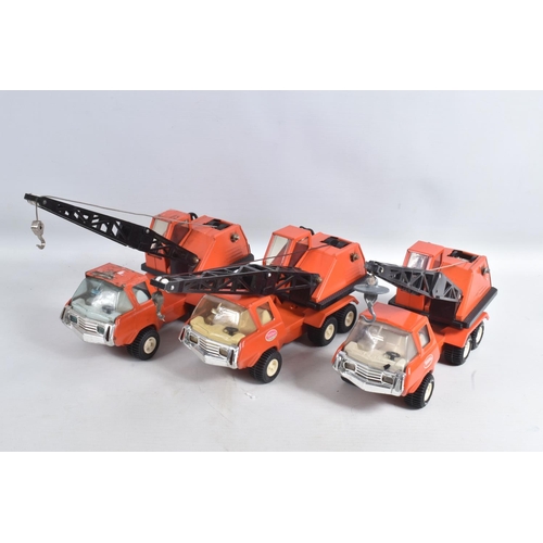 105 - SIX MINI TONKA TOYS LORRY/TRUCK MOUNTED CRANES, all in orange livery and appear largely complete and... 