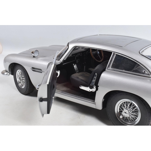 107 - A CONSTRUCTED 1/8 SCALE MODEL OF THE JAMES BOND 007 GOLDFINGER ASTON MARTIN DB5, from the G.E. Fabbr... 