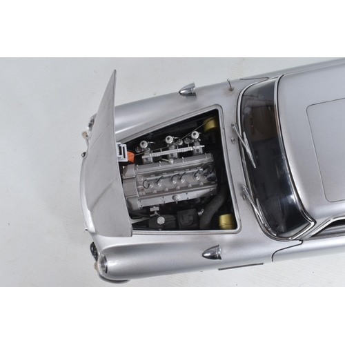 107 - A CONSTRUCTED 1/8 SCALE MODEL OF THE JAMES BOND 007 GOLDFINGER ASTON MARTIN DB5, from the G.E. Fabbr... 