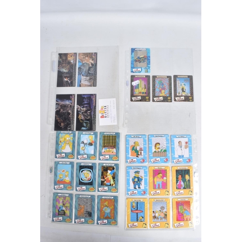 110 - A COLLECTION OF TRADING CARDS, to include a selection of Austin Powers cards in a plastic sleeve, a ... 