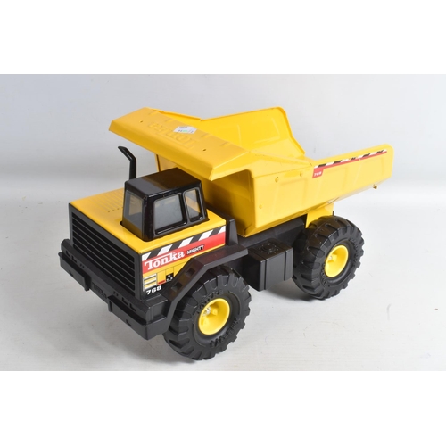 118 - FOUR MIGHTY TONKA TOYS DUMPER TRUCKS, all are later versions with plastic chassis, all in playworn c... 