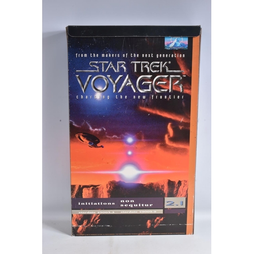 120 - A QUANTITY OF STAR TREK COLLECTORS ITEMS, to include an advertisement board displaying Paramount Sta... 