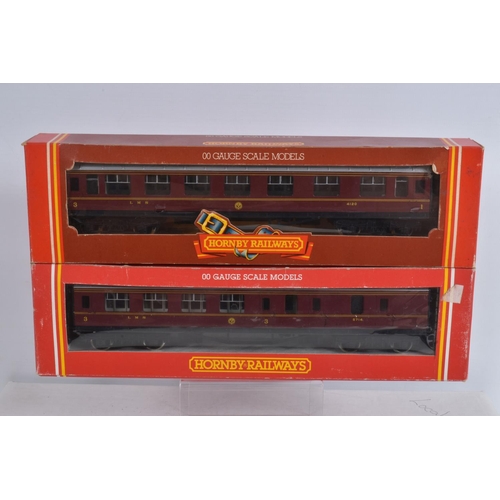 129 - A QUANTITY OF BOXED AND UNBOXED OO GAUGE HORNBY AND LIMA MODEL RAILWAY ITEMS, comprising boxed Hornb... 