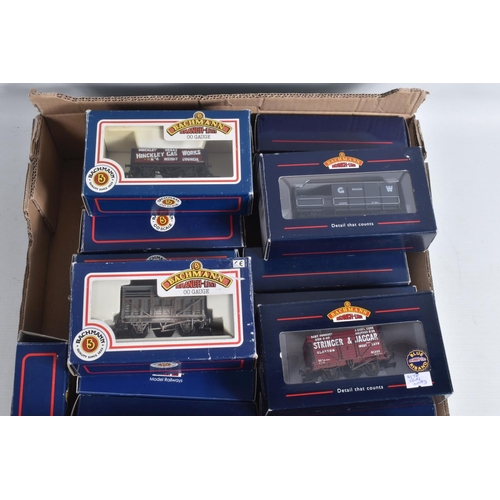 170 - A QUANTITY OF BOXED BACHMANN OO GAUGE FREIGHT ROLLING STOCK, majority are wagons of L.M.S. or G.W.R.... 