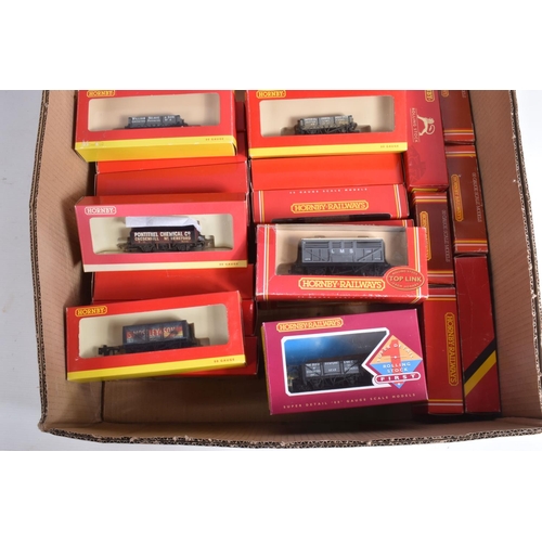 174 - A QUANTITY OF BOXED HORNBY RAILWAYS OO GAUGE FREIGHT ROLLING STOCK, also includes some RailRoad, Tri... 