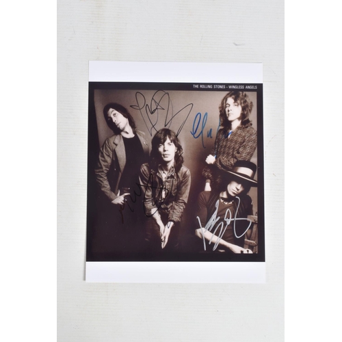 195 - FOUR SIGNED 10   X 8   PHOTOGRAPHS OF THE ROLLING STONES BAND, each photograph is in colour and sign... 