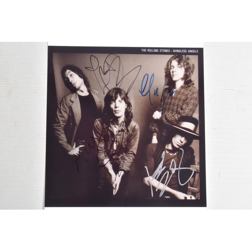 195 - FOUR SIGNED 10   X 8   PHOTOGRAPHS OF THE ROLLING STONES BAND, each photograph is in colour and sign... 