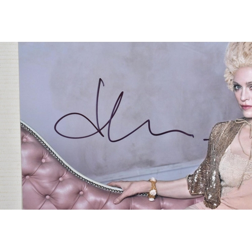 196 - THREE SIGNED 10   X 8   PHOTOGRAPHS OF MADONNA AND ONE SIGNED 10   X 8   SIGNED PHOTOGRAPH OF KYLIE ... 