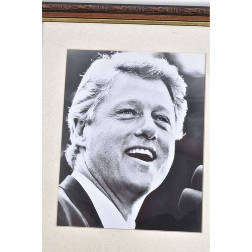 198 - A FRAMED PHOTOGRAPH OF BILL CLINTON, included in the frame is a Dolbadarn Castle, Wales which is sig... 