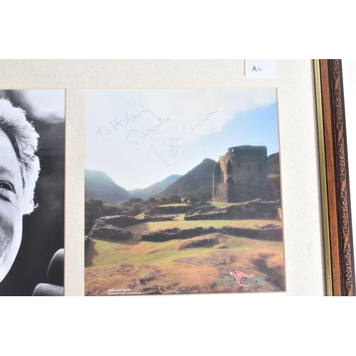 198 - A FRAMED PHOTOGRAPH OF BILL CLINTON, included in the frame is a Dolbadarn Castle, Wales which is sig... 