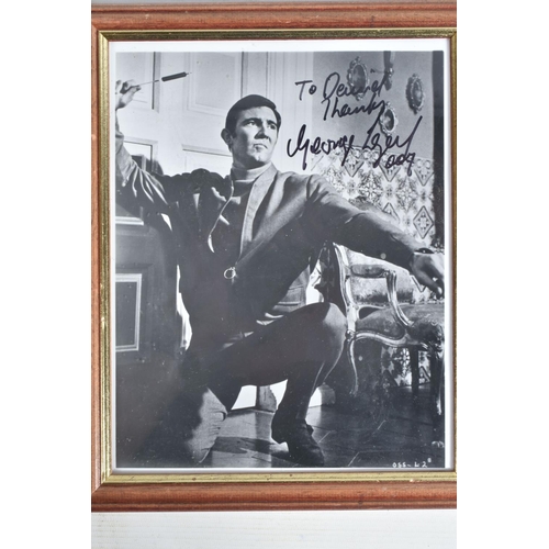 200 - SIGNED AND FRAMED PHOTOGRAPHS OF 007 JAMES BOND, to include a George Lazenby as secret agent James B... 