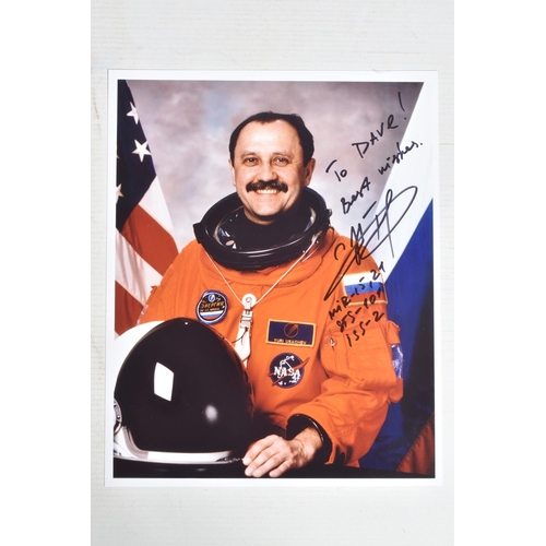 204 - A COLLECTION OF SIGNED PHOTOGRAPHS WITH ASTRONAUT AND COSMONAUT INTEREST, to include 3 Russian cosmo... 