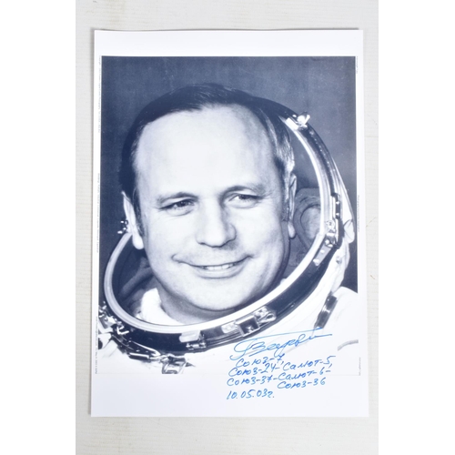 204 - A COLLECTION OF SIGNED PHOTOGRAPHS WITH ASTRONAUT AND COSMONAUT INTEREST, to include 3 Russian cosmo... 