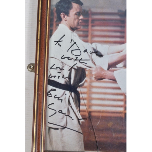 212 - A COLLECTION OF FRAMED SIGNED PHOTOGRAPHS, to include David Soul on a Starsky and Hutch print, Rober... 