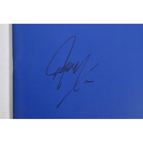 222 - A SIGNED 25LIVE GEORGE MICHAEL PROGRAMME, 35cm x 30cm, signed to the front blue panel