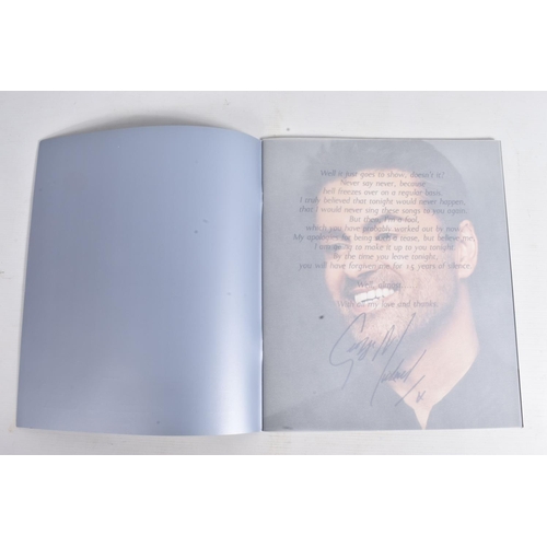 224 - A SIGNED 25LIVE GEORGE MICHAEL PROGRAMME, 35cm x 30cm, signed to the front blue panel