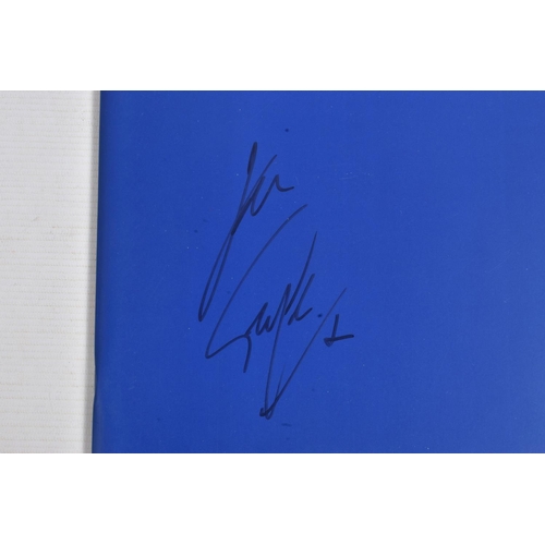 225 - A SIGNED 25LIVE GEORGE MICHAEL PROGRAMME, 35cm x 30cm, signed to the front blue panel