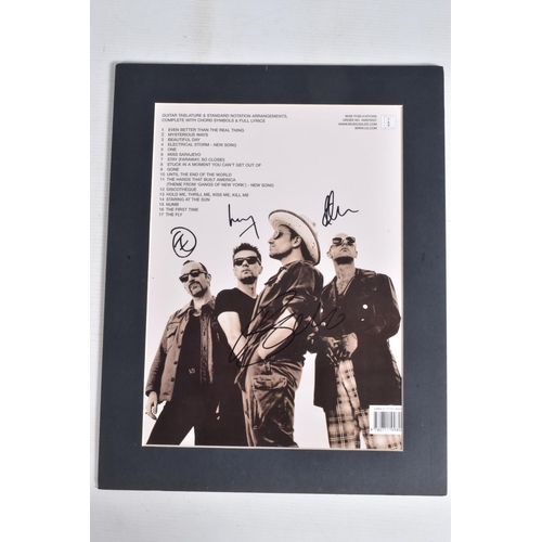 232 - TWO SIGNED ALBUM COVERS, to include a Guitar Tablature sheet music Best of 1990-2000 signed in black... 