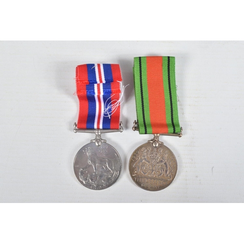 234 - A WWI VICTORY MEDAL AND FOUR WWII MEDALS, the Victory medal is named to Private 11906 Hugh Lear Devo... 