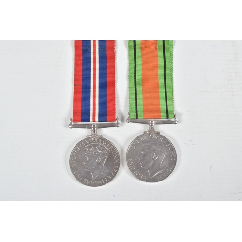 236 - ATTRIBUTED WWII MEDAL GROUP, & OTHER INSIGNIA, a War & Defence Medal pair together with RAF Cap badg... 