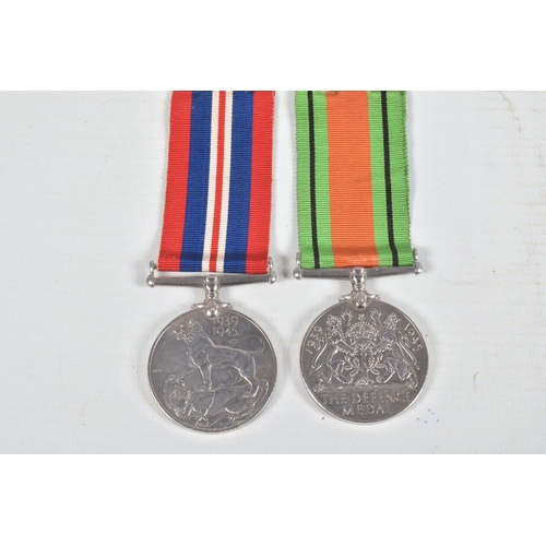 236 - ATTRIBUTED WWII MEDAL GROUP, & OTHER INSIGNIA, a War & Defence Medal pair together with RAF Cap badg... 