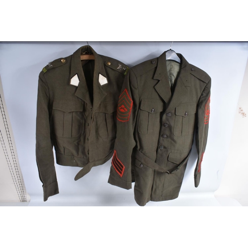 238 - A COLLECTION OF MILITARY ITEMS, to include uniform, buttons, cap badges, etc, the uniforms include a... 