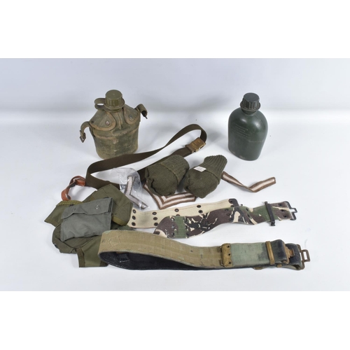 238 - A COLLECTION OF MILITARY ITEMS, to include uniform, buttons, cap badges, etc, the uniforms include a... 