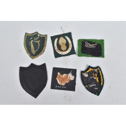 254 - RIKER DISPLAY CASE, containing  over 30 Formation patches to units including Northern Ireland Comman... 