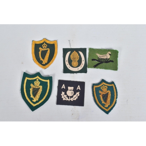 254 - RIKER DISPLAY CASE, containing  over 30 Formation patches to units including Northern Ireland Comman... 