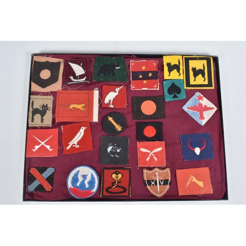 265 - RIKER DISPLAY CASE CONTAINING over 25 WW2 period Formation patches including 404th East Bengal, Sout... 