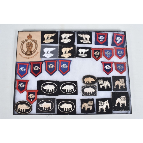 267 - RIKER DISPLAY CASE CONTAINING over 30 formation patches from British Units WW2 era, to include 49th ... 