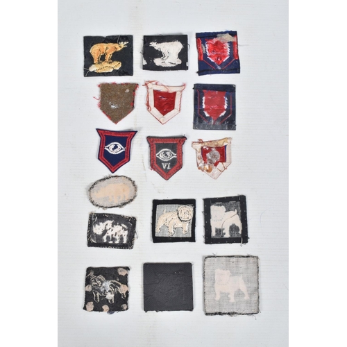 267 - RIKER DISPLAY CASE CONTAINING over 30 formation patches from British Units WW2 era, to include 49th ... 