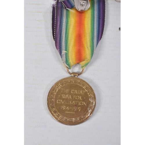 272 - A PAIR OF WWI MEDALS NAMED TO PRIVATE T.W. BLOODWORTH ADN AN ICE BUCKET, the medals are mounted for ... 